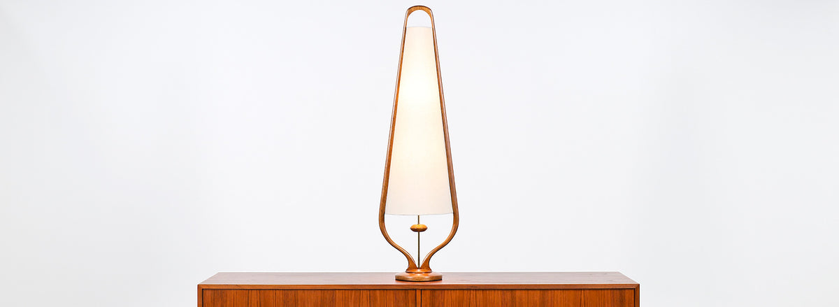 Mid-Century Modern Sculpted Walnut Arc and Brass Table Lamp by Modeline