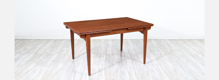 Danish Modern Expanding Teak Draw-Leaf Dining Table