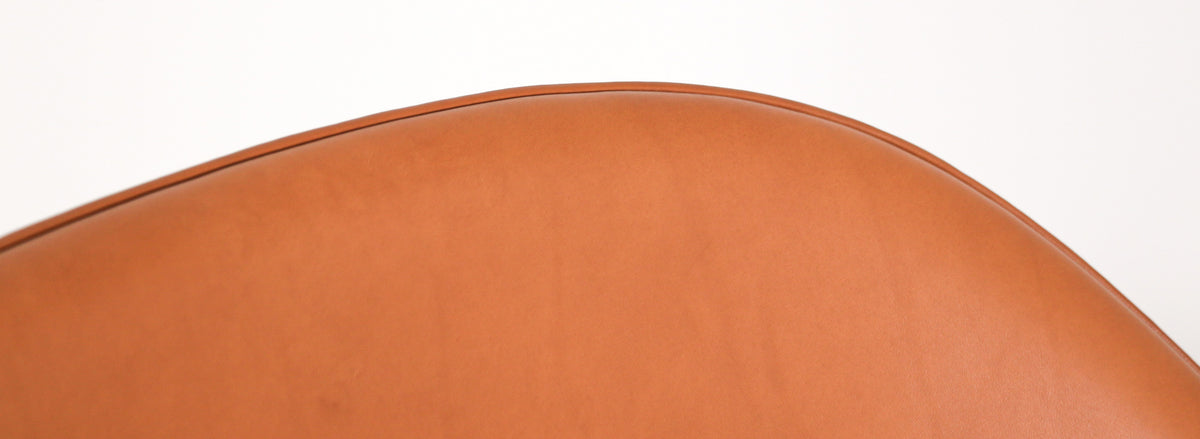 Vintage "Womb" Tan Leather Chair with Ottoman by Eero Saarinen for Knoll 