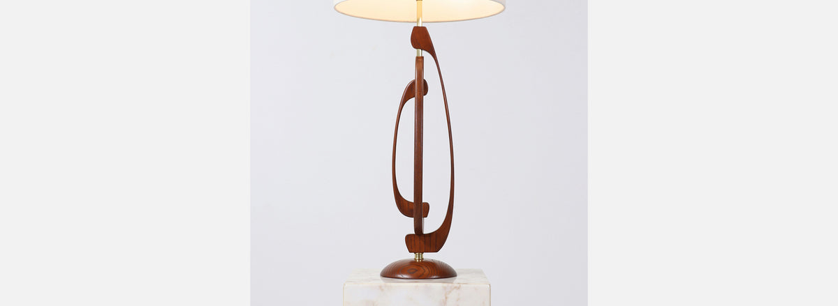 Mid-Century Sculpted Walnut Table Lamp with Brass Accent