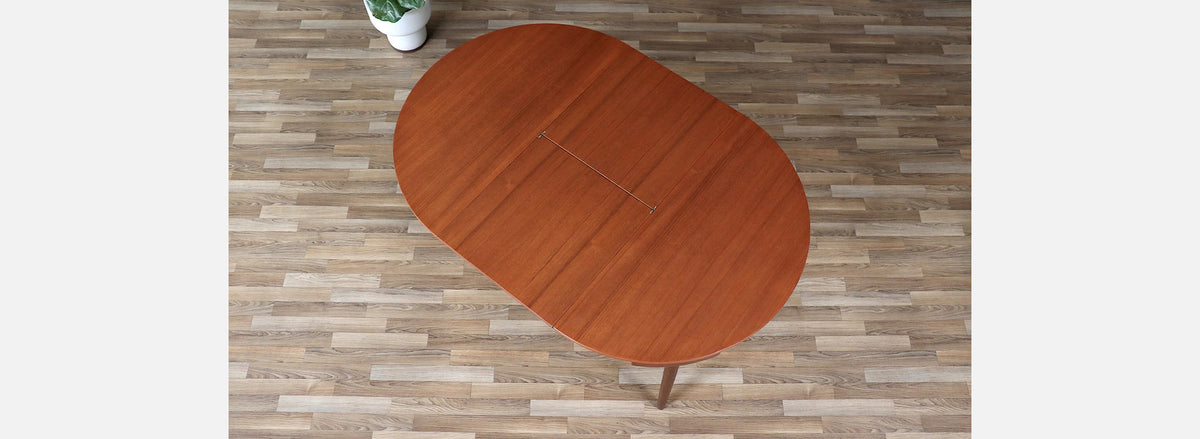 Danish Modern “Roundette” Expanding Butterfly-Leaf Dining Set by Hans Olsen