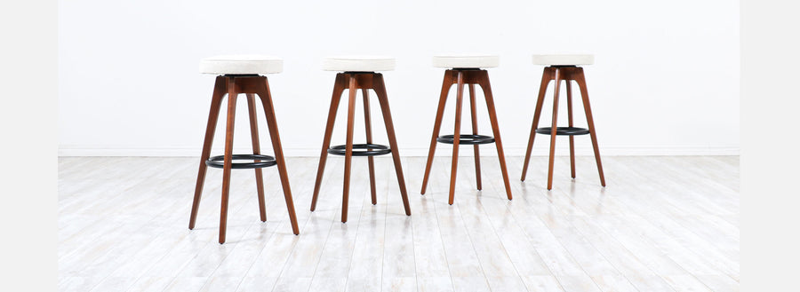 Chet Beardsley Sculpted Walnut Swiveling Stools for Living Design 