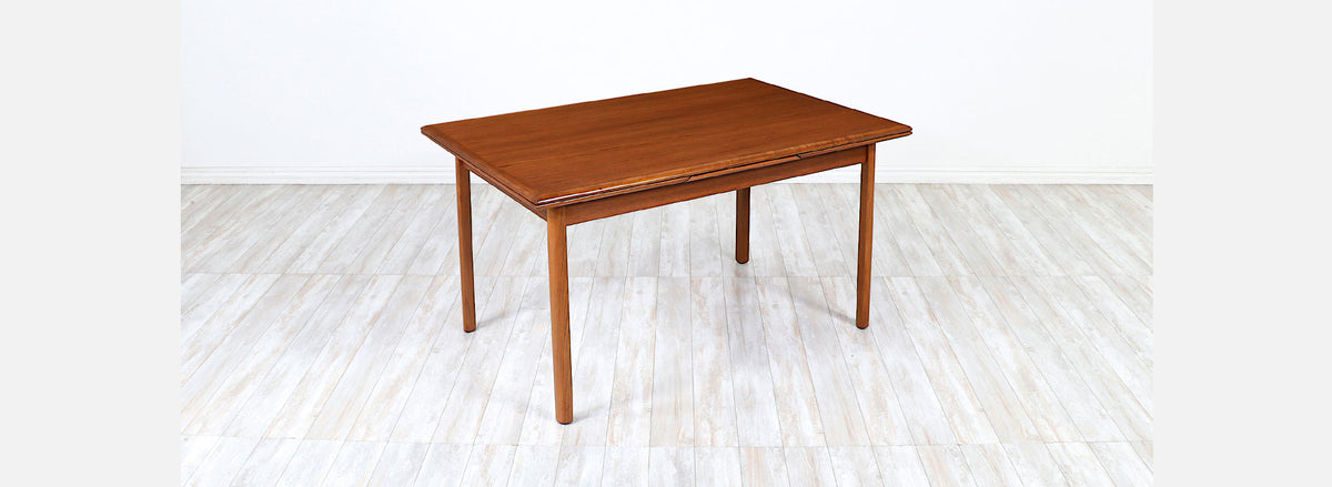 Danish Modern Expanding Teak Dining Table with Draw-Leaves
