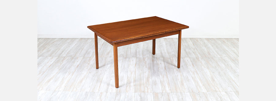 Danish Modern Expanding Teak Dining Table with Draw-Leaves