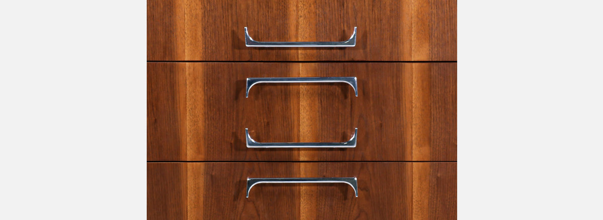 Mid-Century Modern Walnut Chest of Drawers with Sculpted Chrome Pulls