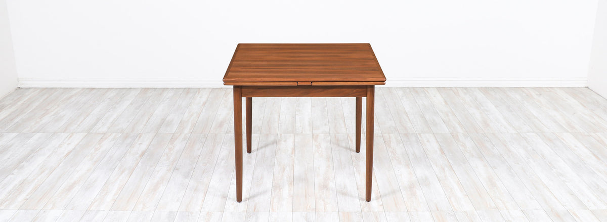 Danish Modern Expanding Draw-Leaf Walnut Dining Table 