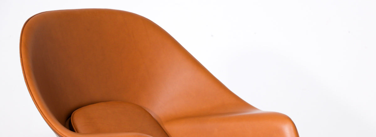 Vintage "Womb" Tan Leather Chair with Ottoman by Eero Saarinen for Knoll 
