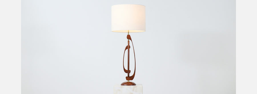 Mid-Century Sculpted Walnut Table Lamp with Brass Accent