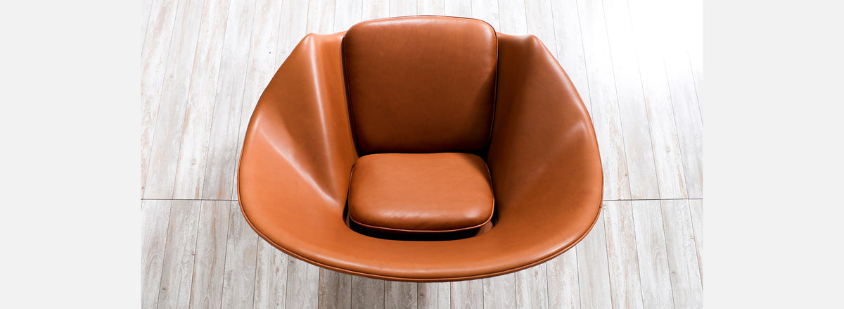Vintage "Womb" Tan Leather Chair with Ottoman by Eero Saarinen for Knoll 
