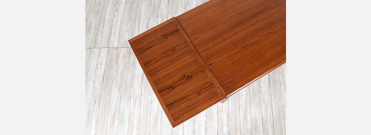 Danish Modern Expanding Teak Dining Table with Draw-Leaves