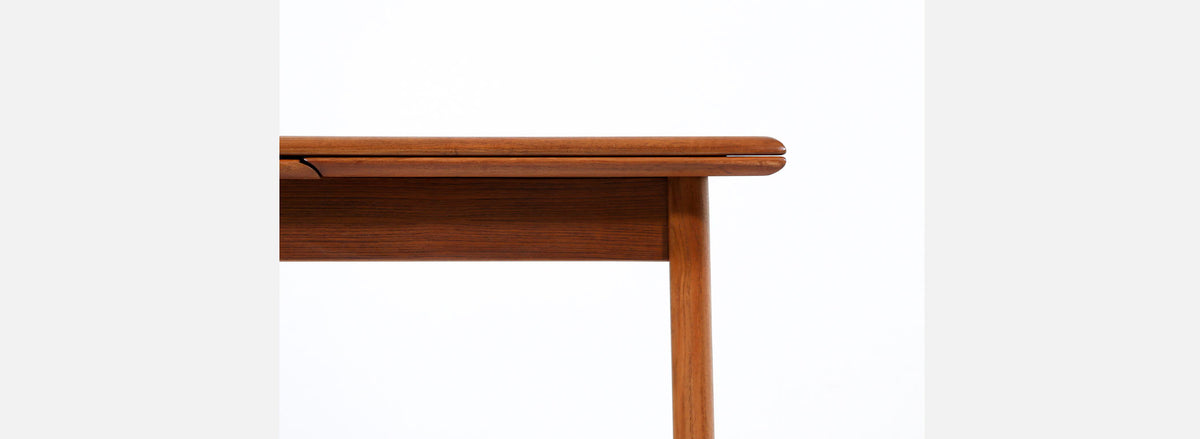 Danish Modern Expanding Teak Dining Table with Draw-Leaves