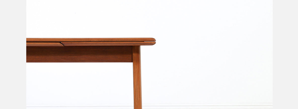 Danish Modern Expanding Teak Dining Table with Draw-Leaves