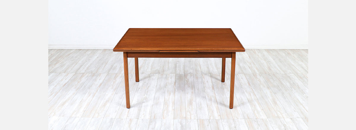 Danish Modern Expanding Teak Dining Table with Draw-Leaves