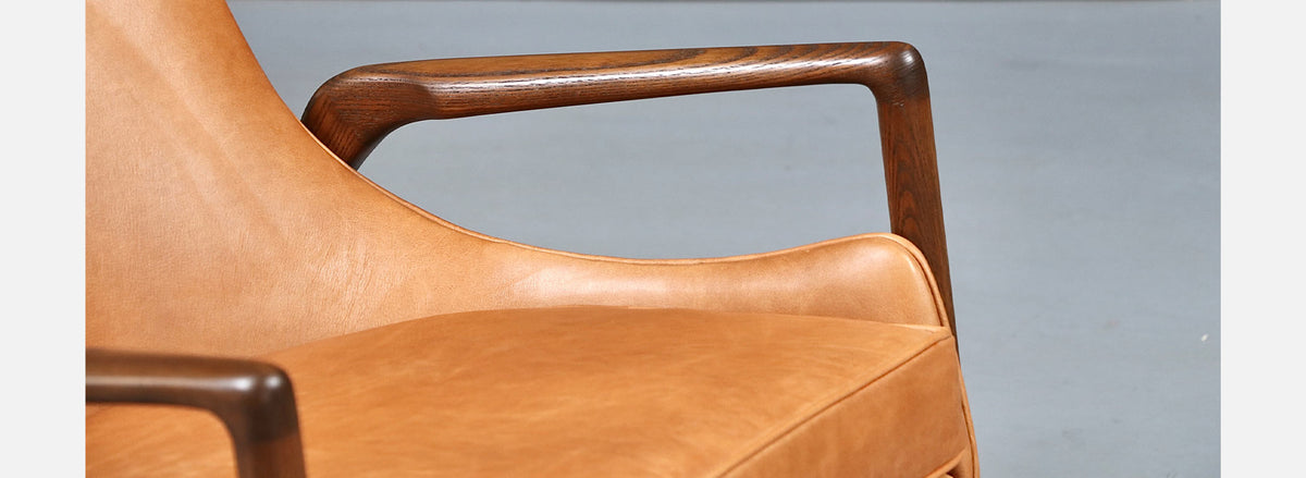 Danish Modern Leather Sculpted Lounge Chairs by Ib Kofod-Larsen