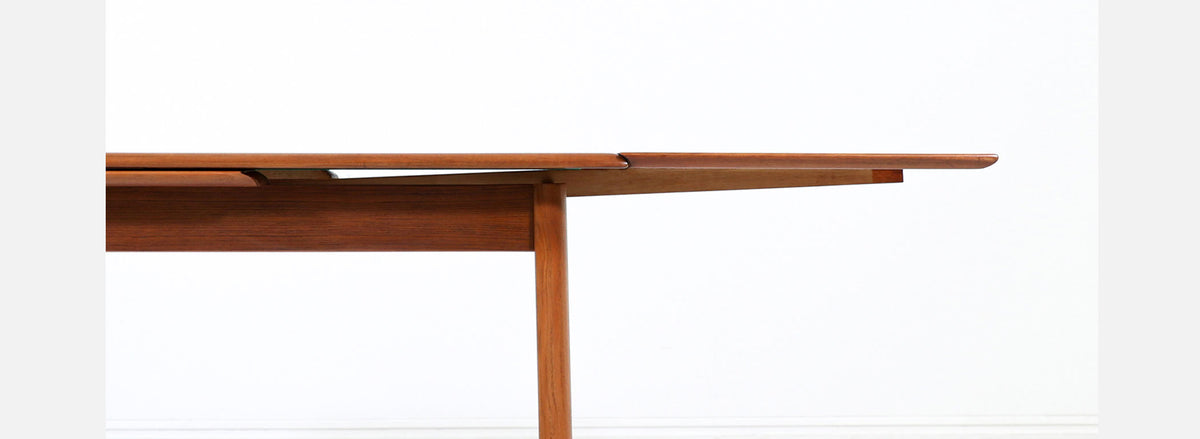 Danish Modern Expanding Teak Dining Table with Draw-Leaves