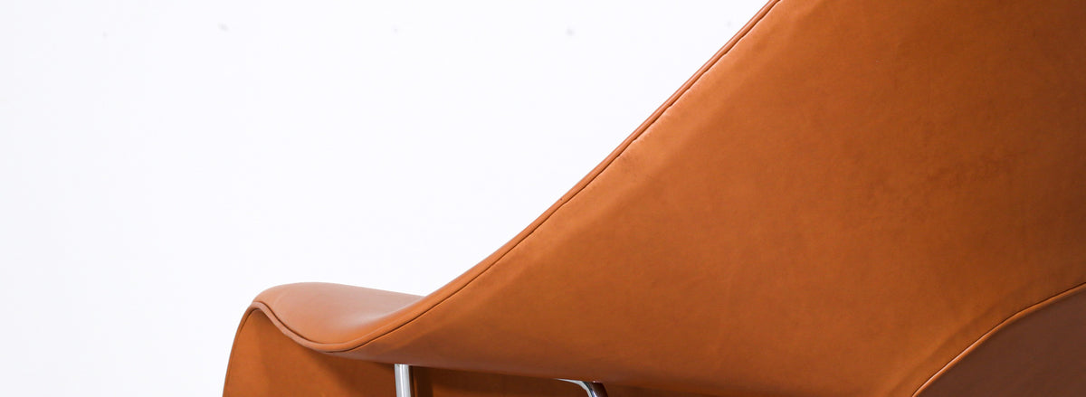 Vintage "Womb" Tan Leather Chair with Ottoman by Eero Saarinen for Knoll 